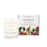 An apple scented candle from Home County Co. The cotton wick soy candle is shown next to the eco friendly candle box packaging which displays an illustration of a bottle of cider with the apples that made it.