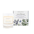 A woodland bluebell and jasmine scented candle from Home County Co. The cotton wick soy candle is shown next to the eco friendly candle box packaging.