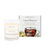 An Earl Grey and cucumber scented candle from Home County Co. The cotton wick soy candle is shown next to the eco friendly candle box packaging.